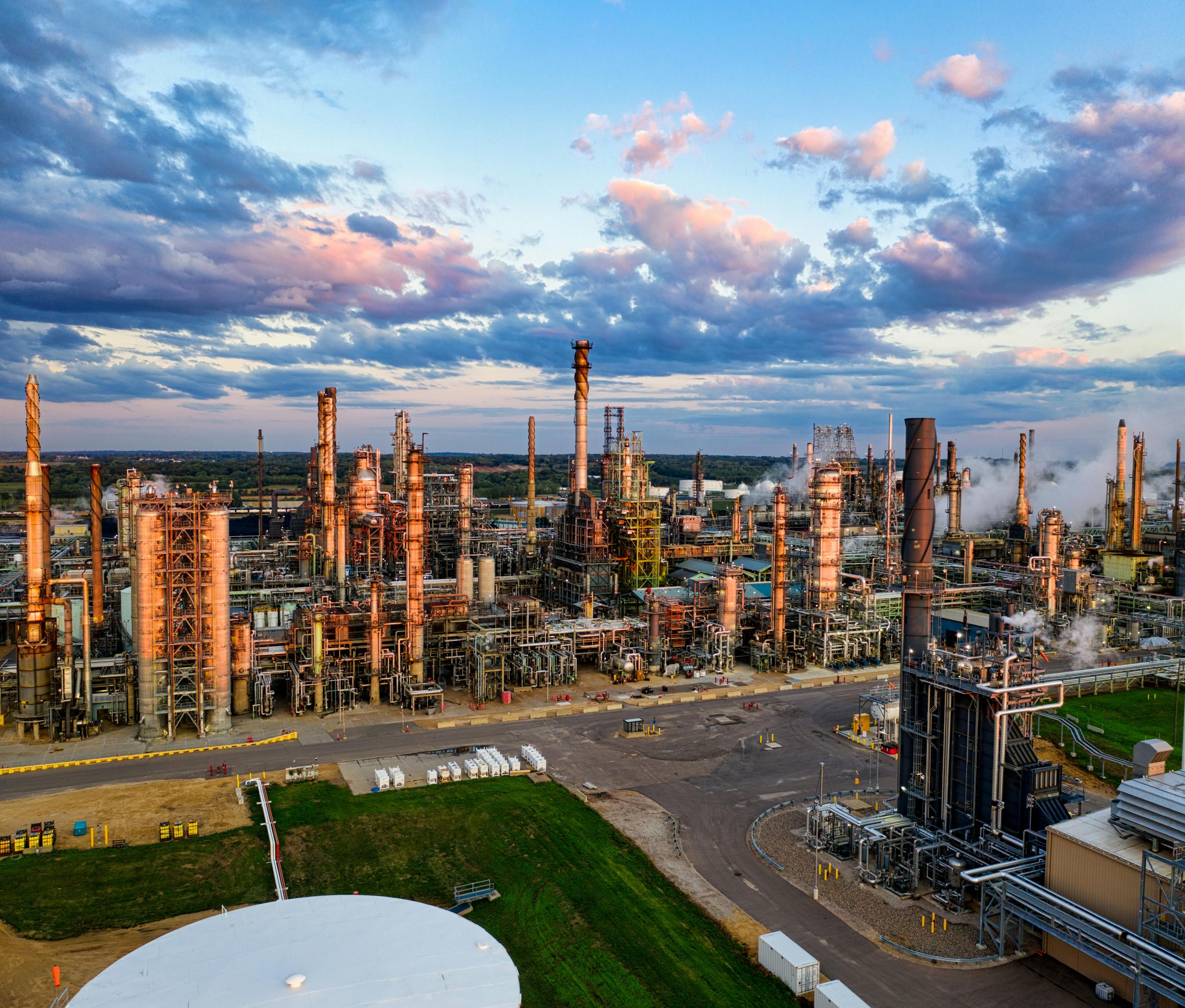 Stunning aerial shot of an oil refinery in Rosemount, MN, showcasing industrial complexity at sunset.